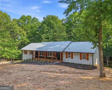 Beautifully Renovated Ranch on 2.2 Private Acres in Cherokee - photo 2