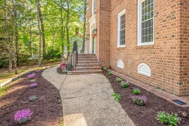Welcome to 108 Woodmere Drive, an extensively renovated custom - photo 3