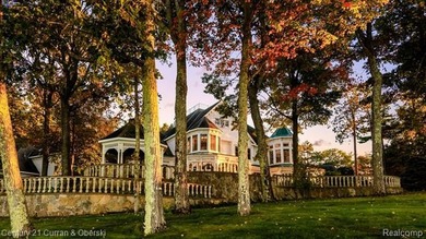 As soon as the gate opens, the quarter-mile driveway leads you - photo 13