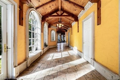 As soon as the gate opens, the quarter-mile driveway leads you - photo 48