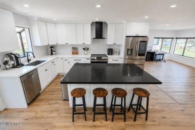 Welcome home to this beautifully updated smart home located in - photo 1