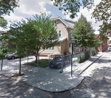 a well-maintained two-family home situated on a desirable 40' x - photo 2
