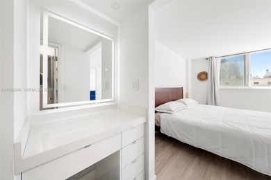 Experience South of Fifth living at its finest in this