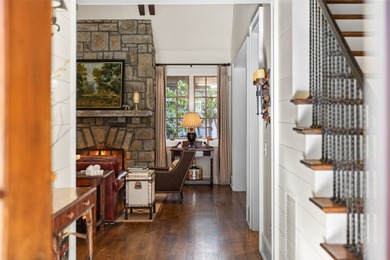 This turn-key home is located in the prestigious, gated - photo 3