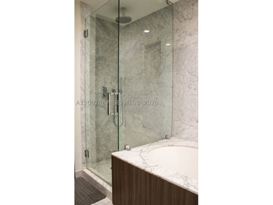 Experience luxury living in this beautifully finished unit - photo 8