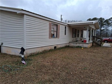 Come check out this doublewide mobile home on a permanent