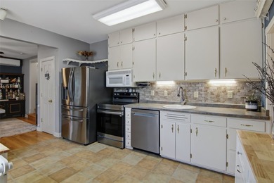 This 4-bedroom, 2-bath home pairs vintage charm with everyday - photo 3