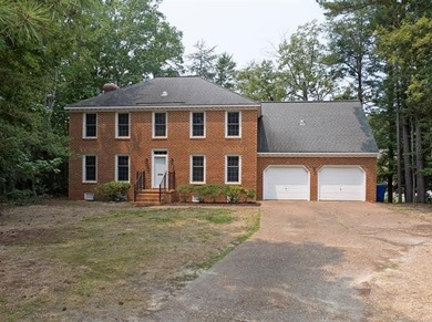 Welcome to this stunning executive-style waterfront brick home - photo 3