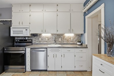 This 4-bedroom, 2-bath home pairs vintage charm with everyday - photo 4