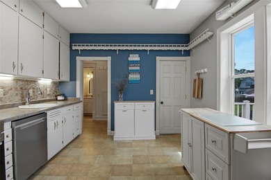 This 4-bedroom, 2-bath home pairs vintage charm with everyday - photo 6