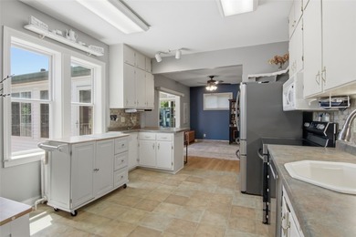 This 4-bedroom, 2-bath home pairs vintage charm with everyday - photo 7
