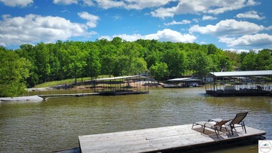 Tucked away in a quiet lakeside subdivision, this charming - photo 2