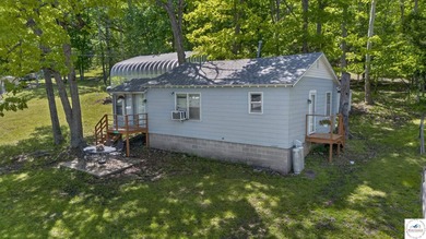 Tucked away in a quiet lakeside subdivision, this charming - photo 4