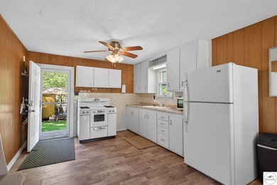 Tucked away in a quiet lakeside subdivision, this charming - photo 10