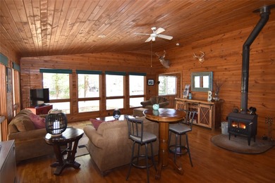 Nestled among mature pines and hardwoods, this adorable cabin - photo 13