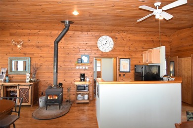 Nestled among mature pines and hardwoods, this adorable cabin - photo 14