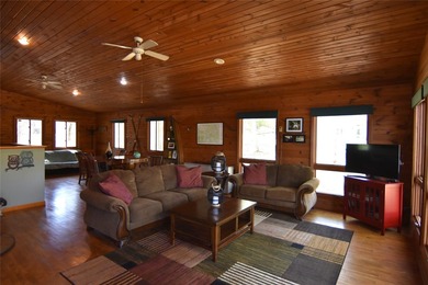 Nestled among mature pines and hardwoods, this adorable cabin - photo 16