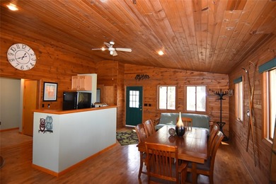 Nestled among mature pines and hardwoods, this adorable cabin - photo 20