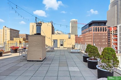 Don't miss this corner unit condo in The Paxton, a landmark - photo 21