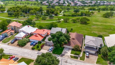 Rare custom home backing directly to a scenic city park with - photo 2