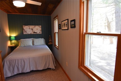 Nestled among mature pines and hardwoods, this adorable cabin - photo 24