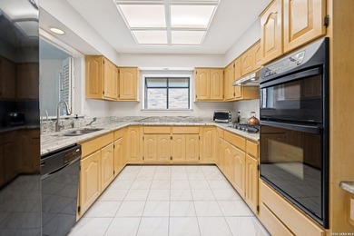 Rare custom home backing directly to a scenic city park with - photo 10