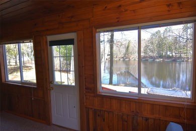 Nestled among mature pines and hardwoods, this adorable cabin - photo 31
