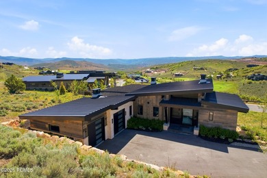 Situated within the gated community of Tuhaye, this custom - photo 2