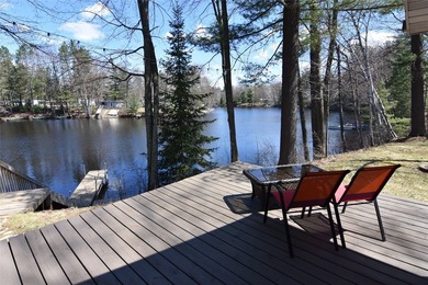 Nestled among mature pines and hardwoods, this adorable cabin - photo 32
