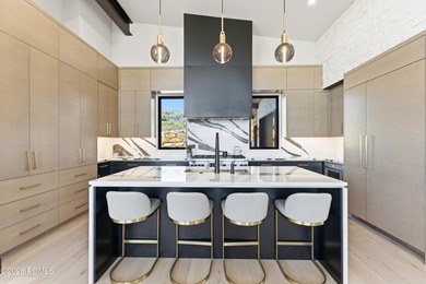 Situated within the gated community of Tuhaye, this custom - photo 8