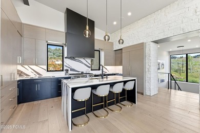 Situated within the gated community of Tuhaye, this custom - photo 9