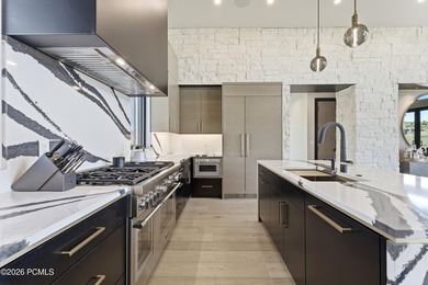 Situated within the gated community of Tuhaye, this custom - photo 10