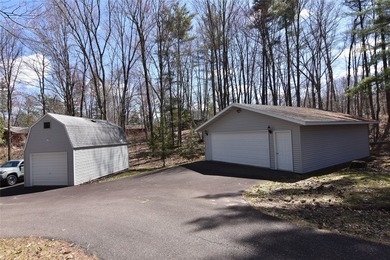 Nestled among mature pines and hardwoods, this adorable cabin - photo 46