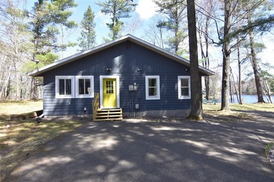Nestled among mature pines and hardwoods, this adorable cabin - photo 47