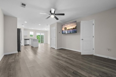 Welcome to 115 Adger Road, a beautifully maintained townhome in - photo 3