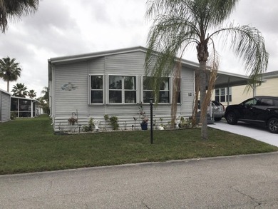 ONE OF THE LARGEST HOMES IN THIS COMMUNITY. THIS 1560 SF HOME IS - photo 1
