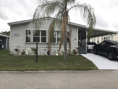 ONE OF THE LARGEST HOMES IN THIS COMMUNITY. THIS 1560 SF HOME IS - photo 2