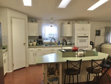 ONE OF THE LARGEST HOMES IN THIS COMMUNITY. THIS 1560 SF HOME IS - photo 3