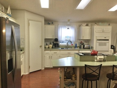 ONE OF THE LARGEST HOMES IN THIS COMMUNITY. THIS 1560 SF HOME IS - photo 4
