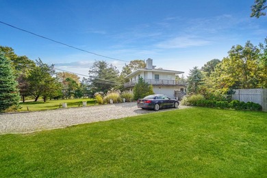 Discover the charm of this unique upside-down beach home nestled - photo 2