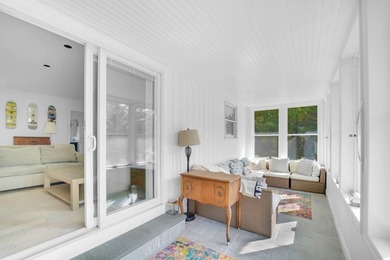 Discover the charm of this unique upside-down beach home nestled - photo 9