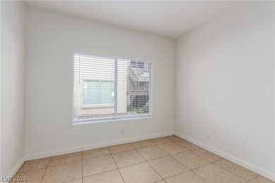 MOVE IN READY, FIRST FLOOR UNIT. Easy access to golf at Painted