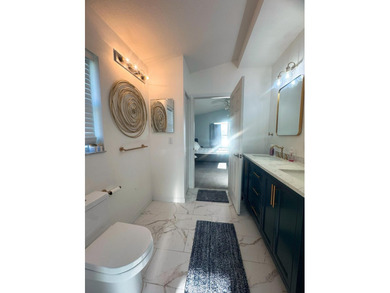 Beautifully maintained 3BR/2BA lake-view home in the gated - photo 31