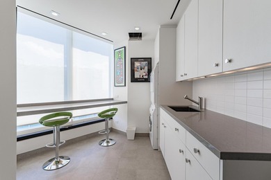 Occupying the top three levels of Las Olas River House - photo 40