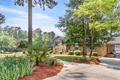 Tucked away on this gorgeous waterfront setting that sits on - photo 3