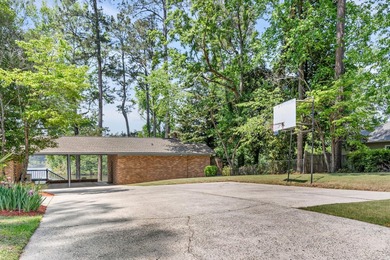 Tucked away on this gorgeous waterfront setting that sits on - photo 5