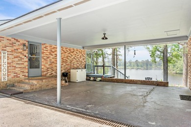 Tucked away on this gorgeous waterfront setting that sits on - photo 6