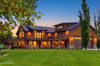 Nestled on an extraordinary 1.17-acre parcel in the charming - photo 1