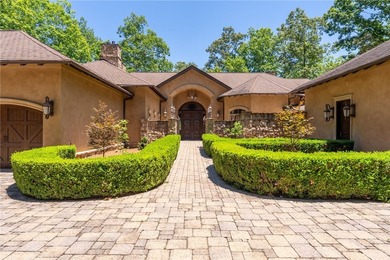 Nestled within the prestigious The Cliffs at Keowee Springs and - photo 3