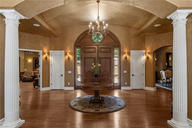 Nestled within the prestigious The Cliffs at Keowee Springs and - photo 4